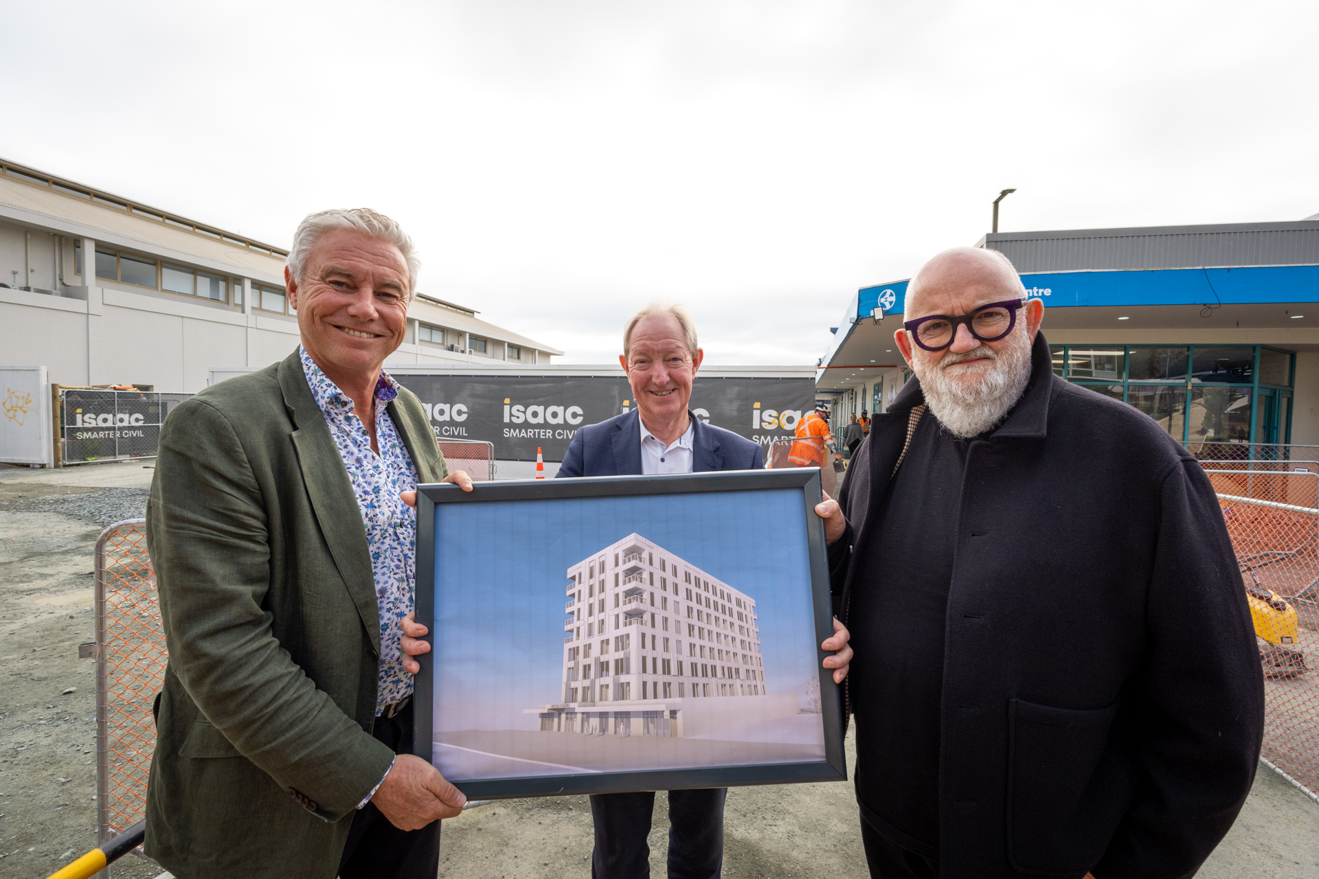 CEO, Mayor and Deputy Mayor holding photo of render